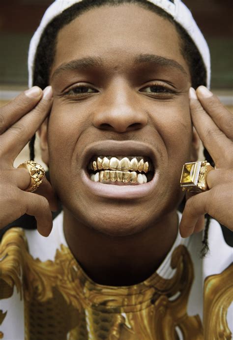 19 Rappers Who Wear Gold Teeth Grills